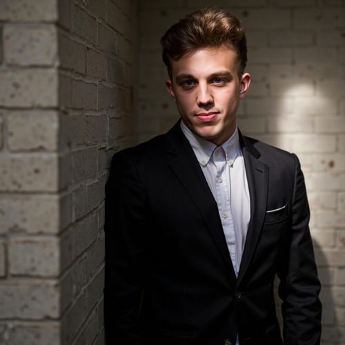 a photo of me MAN, elegantly dressed, half body shot, partially obscured by shadow. MAN looking alluring and dangerous.