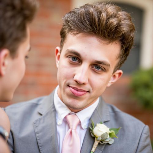 Showcase image for Romantic Moments - Prompt: a photo of me MAN on their wedding day, medium close-up, a soft, loving expression as if looking at their partner off-camera. MAN with eyes full of adoration.