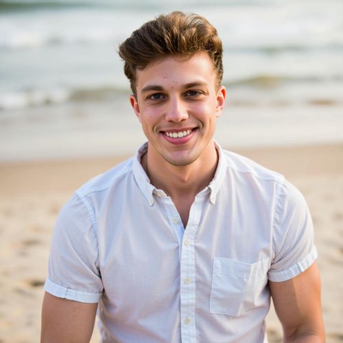 a photo of me MAN at the beach, medium closeup, casual beachwear, friendly smile, sandy shore background, natural sunlight, ocean waves visible. MAN looking at the camera.