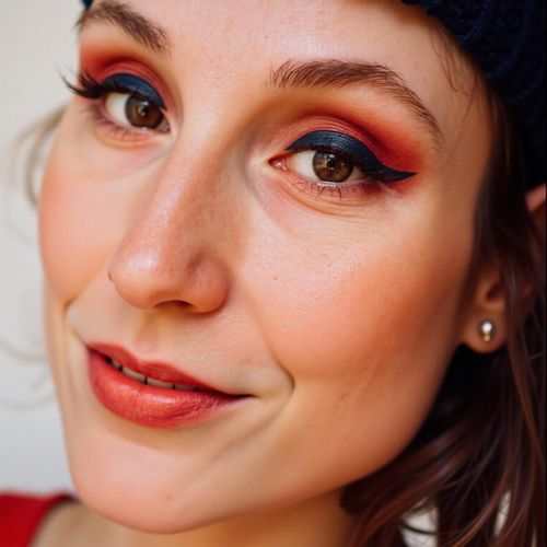 Showcase image for Glamour - Prompt: a photo of me WOMAN with striking, colourful makeup, close-up beauty shot, highlighting expressive eyes. WOMAN looking bold and confident.