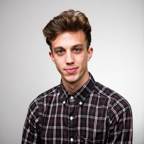 Showcase image for Character Actor - Prompt: a photo of me MAN, character actor headshot, medium shot, conveying a quirky, memorable personality, slightly unconventional attire. MAN with an intriguing expression.