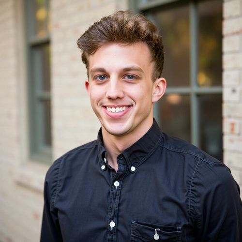 Showcase image for First-Time Buyer Friendly - Prompt: a photo of me MAN, friendly real estate agent, medium shot, exceptionally warm and reassuring smile, soft lighting. MAN looking very approachable.