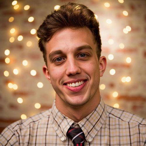 Showcase image for Joyful Celebration - Prompt: a photo of me MAN on their wedding day, medium shot, with a radiant, joyful smile, surrounded by soft, celebratory lights (blurred). MAN looking ecstatic.