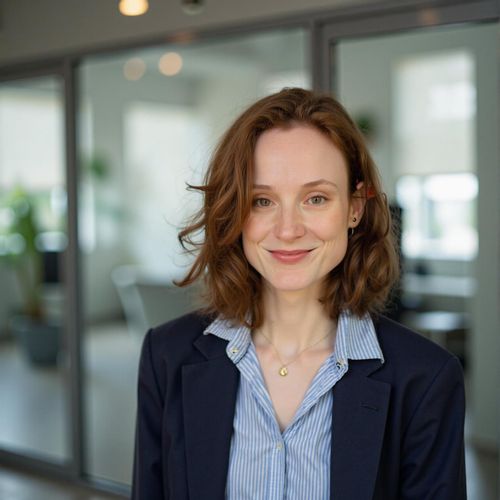 Showcase image for Modern Professional - Prompt: a photo of me WOMAN in smart business casual attire, medium shot, against a modern office backdrop, looking innovative. WOMAN with a friendly, confident smile.