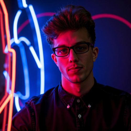 Showcase image for Neon Glow - Prompt: a photo of me MAN bathed in the vibrant glow of neon lights, medium close-up, stylish outfit, reflecting a futuristic nightlife feel. MAN looking cool and modern.